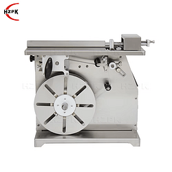 Right angle sealing and labeling machine